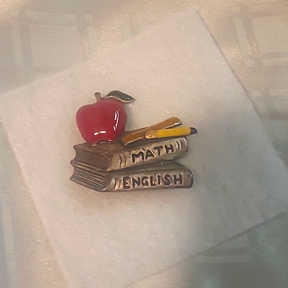 Back to school, BROOCH. APPLE ON TOP OF BOOKS FOR MATH AND ENGLISH